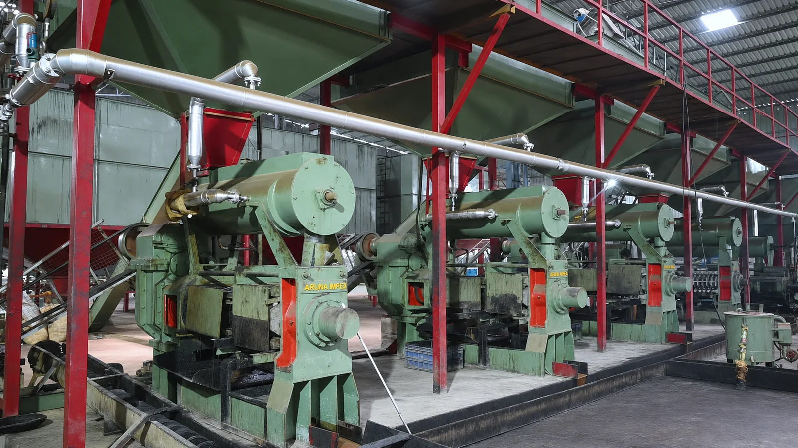 Row of industrial cashew shelling machines